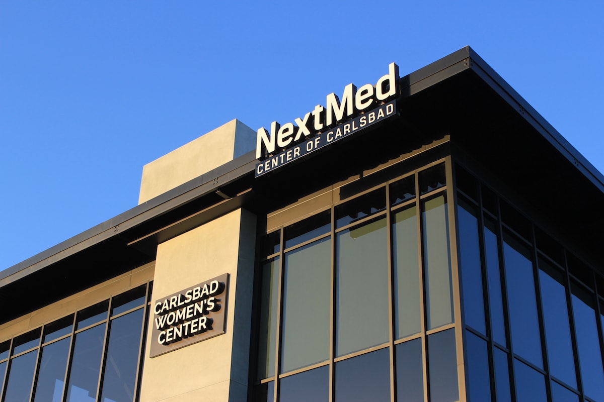 NextMed and Carlsbad women center branded sign