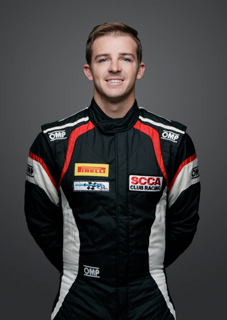 Medium Shot of Alex Kirby in a racing suit